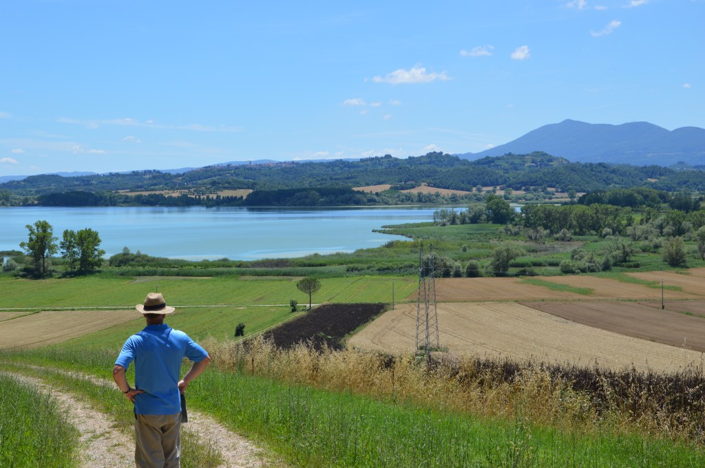 View of the Gioiella-Vaiano Villa site with Lago di Chiusi in the background.